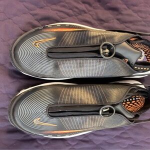 Nike Men’s Black and Orange Slip-On Sneakers